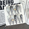 Euro-American Sweet Cool And Spicy Long Stiletto Nails With Metallic 3D Design